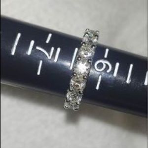 7 diamond, 1 and 1/2 total Karat weight diamond wedding or anniversary ring